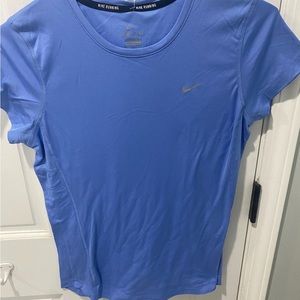Blue Nike Dri-Fit running shirt